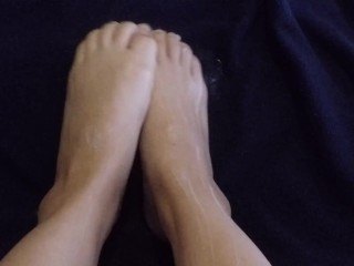 Bare feet lotion massage