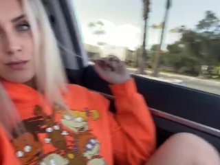 Blonde girl fucks herself and squirts in public