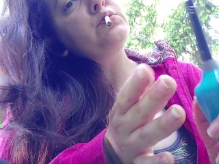 We smoke a cigarette together in a public garden while I show you my big boobs