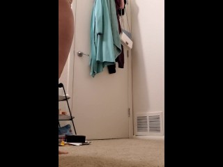 Asian changing in her room