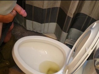 I love holding his cock while he pees! Made a bit of a mess...