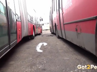 Hot Blonde Pees Between Two Buses