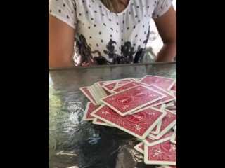 We were playing strip poker outside at our campsites gazebo, she lost so she had to show me her tits