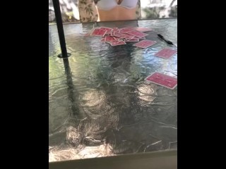 We were playing strip poker outside at our campsites gazebo, she lost so she had to show me her tits