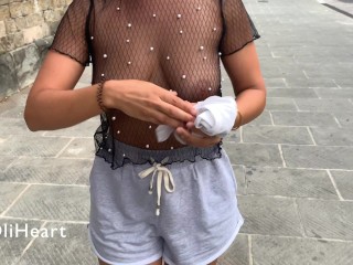 Hot girl changes her top right in the middle of the street