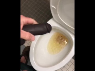 POV Pissing thru my hollow cock sleeve device in a public washroom then tasting the last few P drops