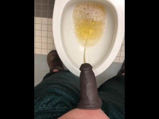 POV Pissing thru my hollow cock sleeve device in a public washroom then tasting the last few P drops