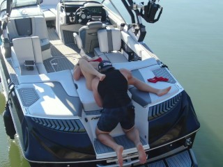 MILF getting her pussy licked on a boat in the middle of the lake