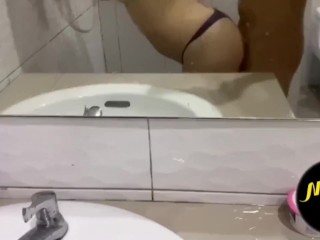 Thai girl showing off her sexy lingerie in the bathroom