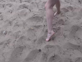 Outdoors foot play on the beach