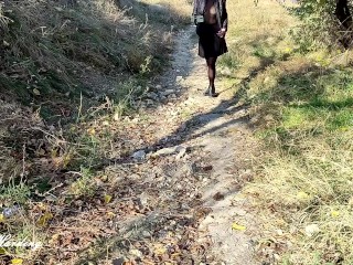 Alice walks in an abandoned park in a sexy see-through T-shirt and shows tits selfies to her studs