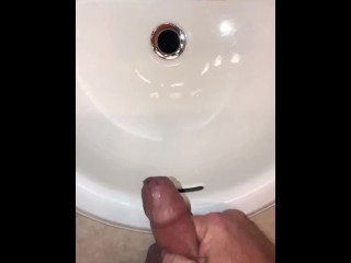 Naughty Pissing and Cumming in my bathroom sink featuring a bullseye cumshot into the drain