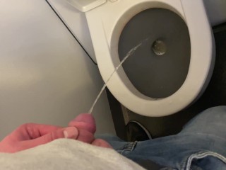 Soft dick pee aboard a moving airplane
