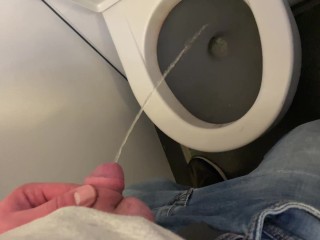 Soft dick pee aboard a moving airplane