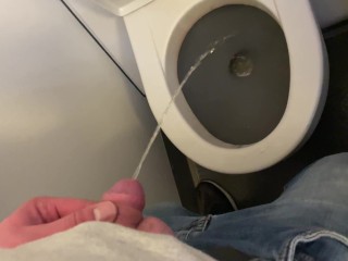Soft dick pee aboard a moving airplane