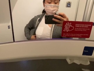 I got SO horny on the plane! I had to play with my swollen Asian tits