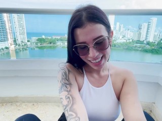 prostitute gives me a blowjob on the balcony of my hotel, overlooking the sea