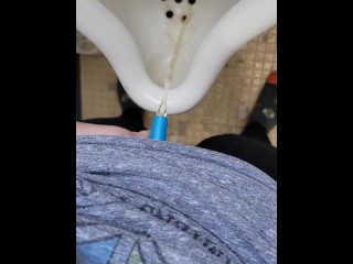 Girl uses shewee to piss in urinal