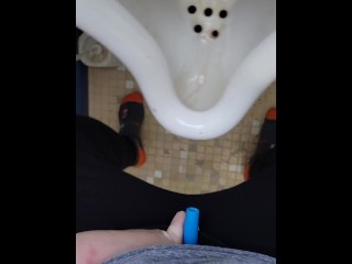 Girl uses shewee to piss in urinal