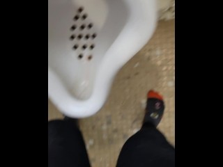 Girl uses shewee to piss in urinal