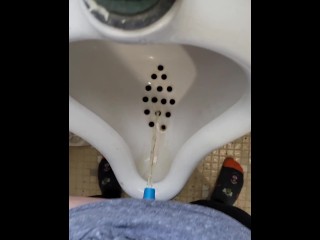 Girl uses shewee to piss in urinal