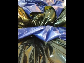 Solo masturbation in PVC raincoat and latex