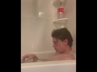 Taking a bubble bath who wants to help wash my body ass and cock