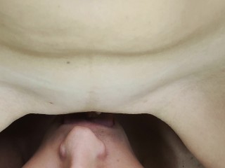 Wet pulsing vulva slides on man's tongue