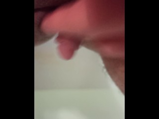 Jerking off my big clit again in the bathroom