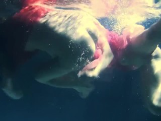 Lesbians and solo girls make out underwater