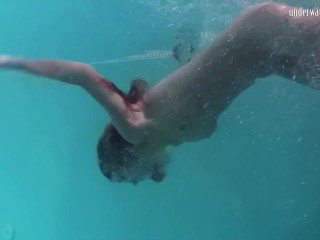 Nikita Vodorezova shows off her sexy body underwater