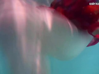 Nikita Vodorezova shows off her sexy body underwater