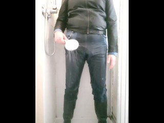 Shower time starting with piss and then fully clothed wetlook in jeans and boots