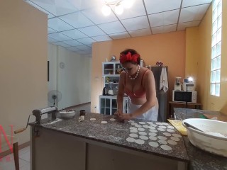 Nudist housekeeper Regina Noir cooking at the kitchen. Naked maid makes dumplings. Naked cooks Bra