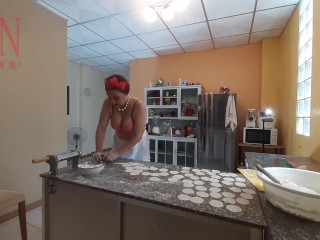 Nudist housekeeper Regina Noir cooking at the kitchen. Naked maid makes dumplings. Naked cooks. Bra1
