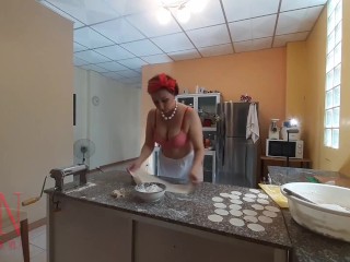 Nudist housekeeper Regina Noir cooking at the kitchen. Naked maid makes dumplings. Naked cooks. Bra