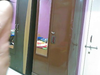 Cute sissy crossdresser in a sexy designer pink-cyan bra only, shaking her big dick.