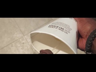 Big dick pissing in cup