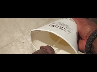 Big dick pissing in cup