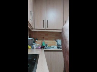 Cumshot in the kitchen. Fit naked man wanking and unloading over kitchen worktop