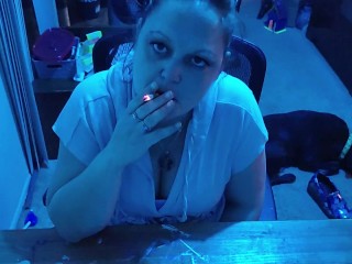 Sexy brunette smoking cigarette while talking dirty and rolling us a joint!