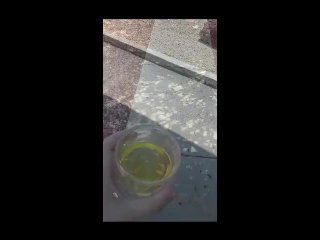 CreamyPussySlut pissing in a cup