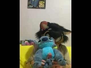 Furry fucking a Disney stitch plushie until he cums.