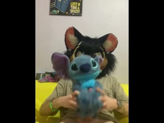 Furry fucking a Disney stitch plushie until he cums.