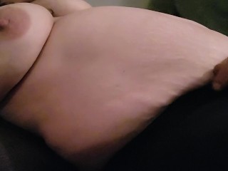 Boyfriend rubs girlfriends growing belly 