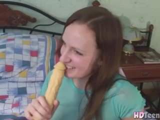 Hot Brunette with natural titrs Sucking Dildo