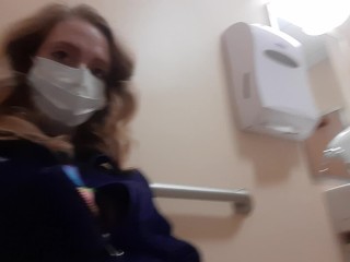 Milf in Northface Plays With Pussy In Public Bathroom 