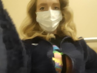 Milf in Northface Plays With Pussy In Public Bathroom 