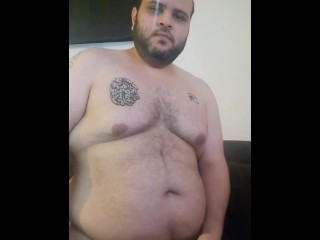 Fat arab infront of computer 