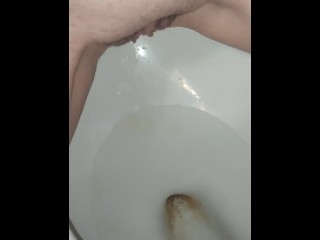 Pissing the wrong way on the toilet 